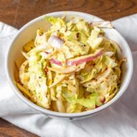 Coleslaw · Sweet and spicy dressed cabbage and Carrot.