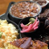 The Bbq Platter · Choice of BBQ (1/2 lb.), choice of two sides, cornbread with brown sugar and maple butter, K...