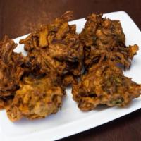Vegetable Pakora · 5 pieces. Fresh vegetables dipped in a delicately spiced batter and deep fried.