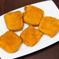 Paneer Pakoras · Deep-fried homemade mint-flavored cottage cheese cubes.