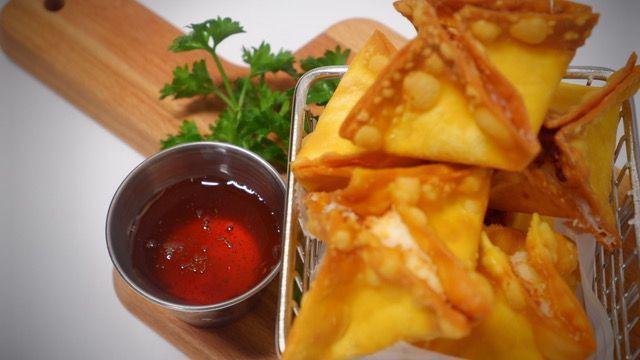 Crab Rangoon · Six pieces. Crabmeat mixed with cream cheese in crispy wonton wrap. Served with sweet and sour sauce.