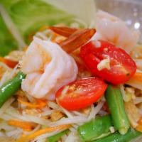 Som Tum Salad · Spicy.Green papaya salad. Famous Thai salad. Chopped green papaya, carrot, shrimp, string be...