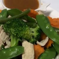 Chicken Garden Lunch · Steamed chicken with carrots, snow pea, broccoli, string bean, and sweet potato served with ...