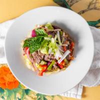 Thai Beef Salads · Grilled beef tenderloin, bell peppers, red onions, scallions, and cucumbers served on bed of...