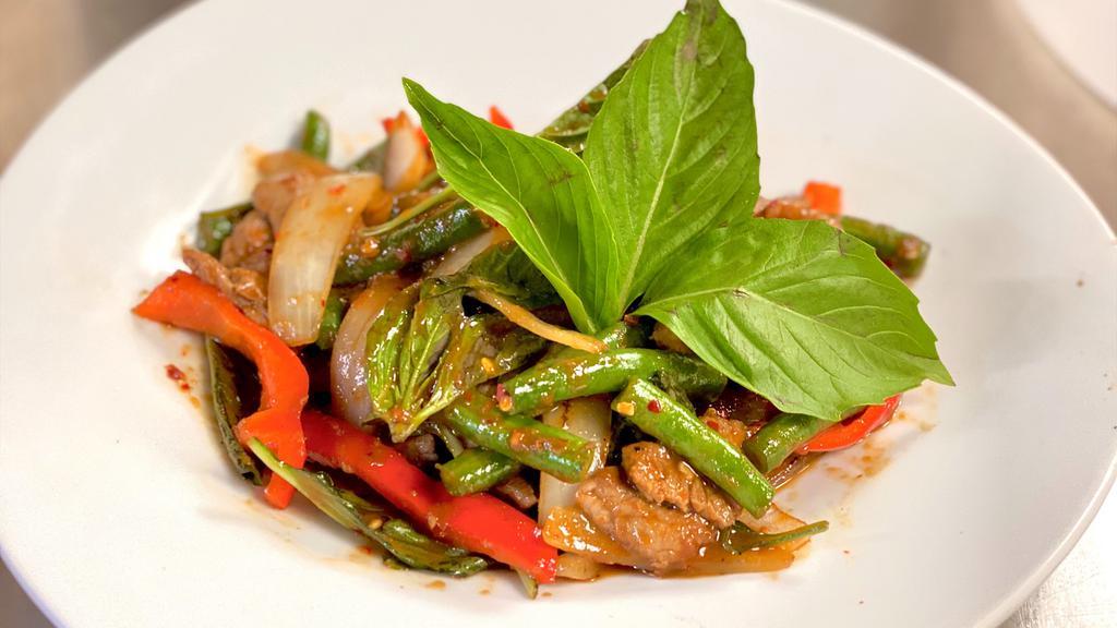 Pad Kaprow · Choice of meat sautéed with thai basil, bell peppers, onions, and green beans with our house special sauce.