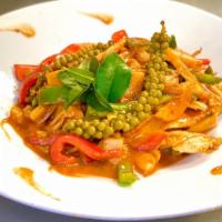 Pad Ped · Sautéed bamboo shoots, bell peppers, basil, and young peppercorn with our creamy sweet curry...