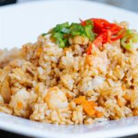 House Fried Rice · Shrimp, chicken and vegetable fried rice.