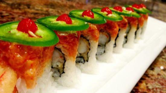  Mexican Roll · Shrimp tempura roll inside, topped with avocado, spicy crabmeat, jalapeno, tobiko.