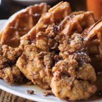 Jfc & Waffles · Our Jewish fried chicken on a waffle with syrup.