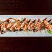 American Dream Roll · Shrimp tempura mango topped with spicy real crab meat mix & tobiko served chef's special sau...