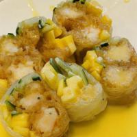 Mango Shrimp Maki Roll · Shrimp tempura, mayo with mango mix.