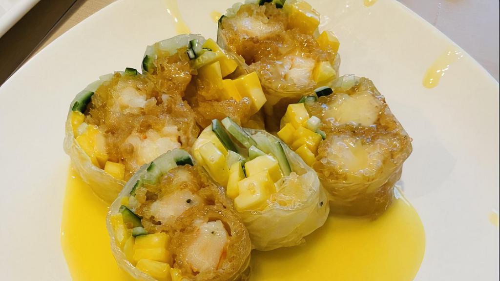 Mango Shrimp Maki Roll · Shrimp tempura, mayo with mango mix.