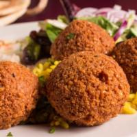Falafel · A blend of chickpeas, parsley, special spices, deep fried served with tahini sauce.