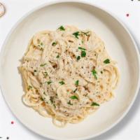 Alfredo Pasta (Spaghetti) · Spaghetti pasta cooked in creamy white sauce. Side salad and garlic bread included.