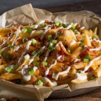 Bacon Cheese Fries Full · Because why not add bacon? Our fries topped with a generous portion of Cheddar Jack cheese, ...