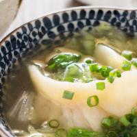 Gyoza Soup · Clear soup with dumplings.