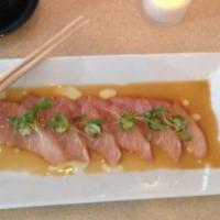 Jalapeno Delight · Any fish sliced w/ jalapeno and yuzu sauce.