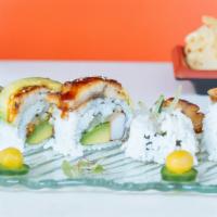 Dragon Maki · Crab stick, masago, cucumber, and avocado, topped with broiled eel.