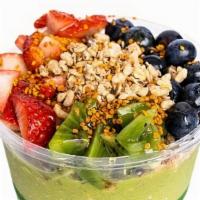 Superfood Bowl · Spinach, kale, avocado, banana, and mango blended together and topped with pumpkin seed and ...
