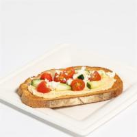 Hummus & Tomato Toast · Organic whole wheat bread, classic hummus, grape tomatoes, diced cucumber, feta cheese, Hima...