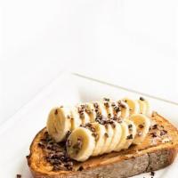 Banana Almond Butter Toast · Organic whole wheat bread, almond butter, sliced banana, cacao nib, and drizzled honey. Add ...