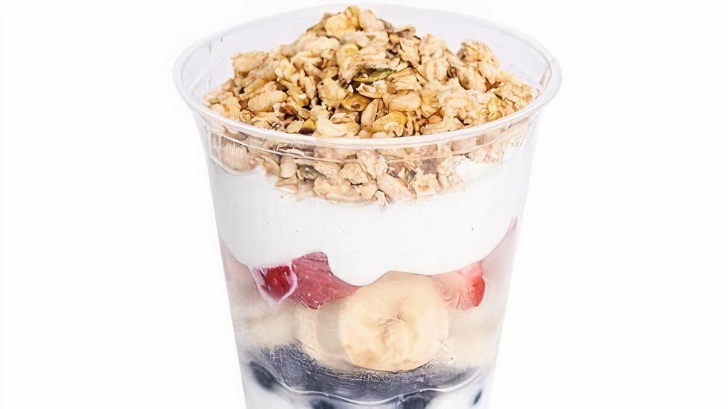 Yogurt Parfait · Greek yogurt, pumpkin seed and flax granola, blueberry, strawberry, banana and topped with honey.