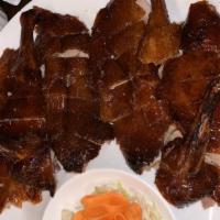 Peking Duck Set Dinner · Whole peking duck. Choice of duck bone soup or sauteed duck bone. Choice of jar jang mein or...