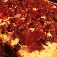 Meat Lover'S Deluxe Pizza (Small 10In) · Pepperoni, sausage, ham, salami, hamburger and bacon.