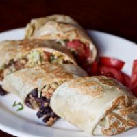 Steak Burrito · Served in flour or wheat tortilla, filled with rice, beans, cheese, pico de gallo, onions, c...