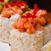 Dynamite Sushi Roll · Tempura calamari, spicy crab, spicy scallops, habanero masago, lettuce, soy bean paper