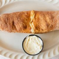 Buffalo Grilled Chicken Stromboli · Served with sauce on the side.