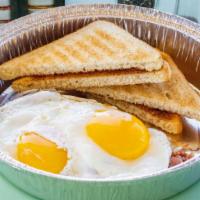 #4 Hash & Eggs · Our own, made in house, corned beef hash with 2 eggs and toast.