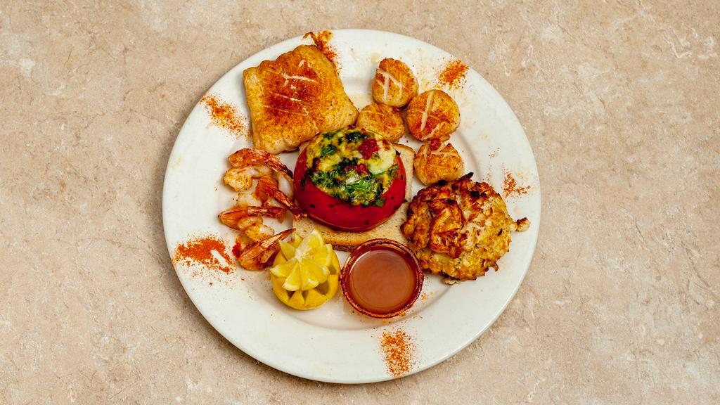 Broiled Seafood Combo · Shrimp, scallops, flounder and crab cake.