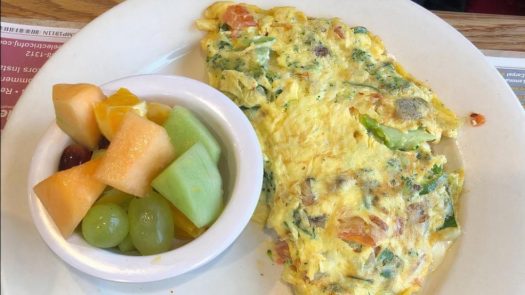 Vegetarian Omelet · Peppers, onions, mushrooms, broccoli, spinach and tomatoes