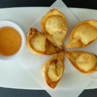 Crab Rangoon · Crispy wonton skin filled with delicious cream cheese mix with imitation crab meat, onion, a...