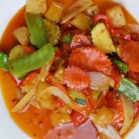 Sweet & Sour · Sautéed onion, bell pepper, tomatoes, carrot, zucchini, pineapple and scallion in thai tomat...