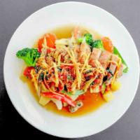 Chili Duck · Spicy. Crispy boneless duck with sautéed assorted Vegetables topped with spicy chili sauce. ...