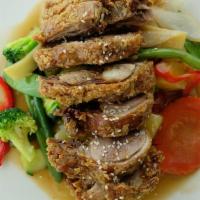 Crispy Duck · Crispy boneless duck with sautéed assorted Vegetables topped with honey and sesame seed. Not...