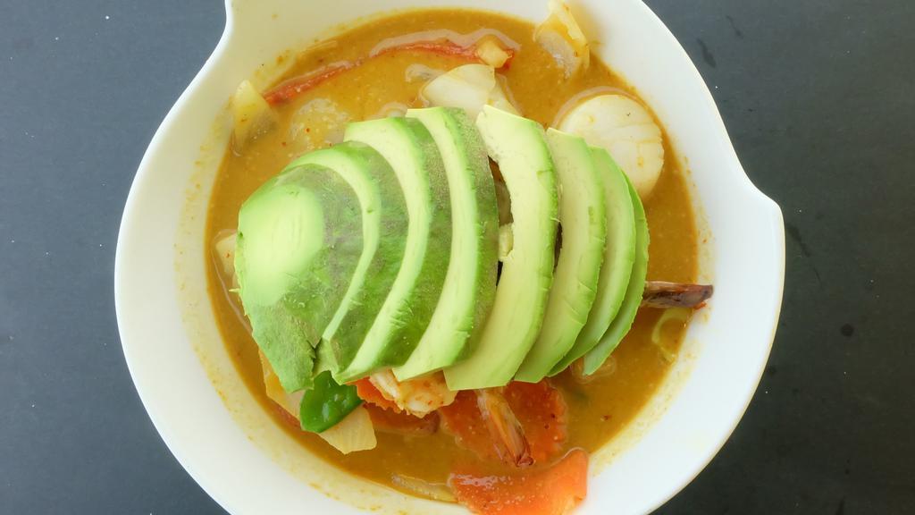 Avocado Dancing (G) · Spicy. Shrimp, scallop, and squid with onion, carrot,  bell pepper, pineapple and zucchini in thai yellow curry serve with rice.