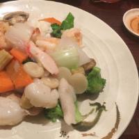 Seafood Combination · Jumbo shrimp, scallops, crab meat, and lobster with mixed vegetables. Served with choice of ...