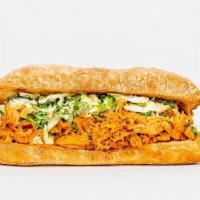 Pulled Barbecue Chicken Sandwich · Pulled barbecue chicken, supergreens slaw.