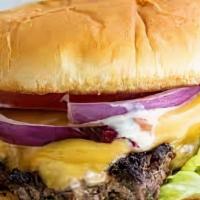 Smash Cheeseburger Combo · Smash burger with cheddar cheese, lettuce, tomatoes, onion, pickles, and mayo. Comes with yo...