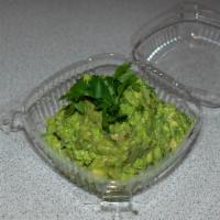 Guacamole & Chips · Made entirely from avocados, onion, cilantro, and lime. Served with our fresh corn chips.