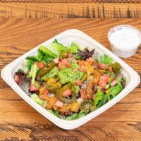Impossible™ Taco Salad · Fresh mixed greens, Impossible™ plant-based protein, Joe’s handcrafted avocado smash, sharp ...