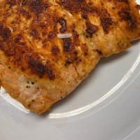 Grilled Salmon · Grilled salmon fillet with bechamel, salad and rice.