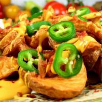 Loaded Sidewinder Fries · Loaded with melted cheese, bacon, jalapeños, and sour cream (735 calories per serving)
