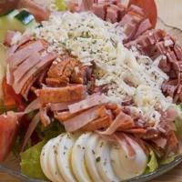 Antipasto Salad · Romaine, iceberg, tomatoes, onions, cucumbers, egg, kalamata olives, roasted peppers, ham, c...