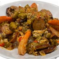 Gumbo · New Orleans styled stew with vegetables, shrimp, crabmeat, and andouille sausage on a bed or...