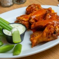 Buffalo Wings (10 Pieces) · Served with celery and your choice of bleu cheese or ranch dressing.