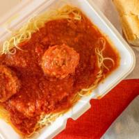 Spaghetti With Meatball · Spaghetti covered in sauce with meatballs, and a side of bread and butter.